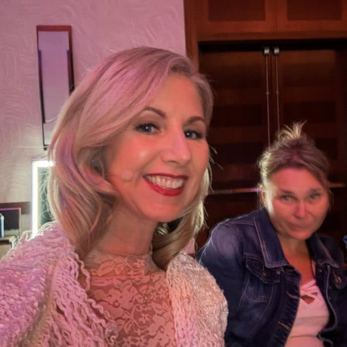 Kimberley backstage before a speaking engagement with team member